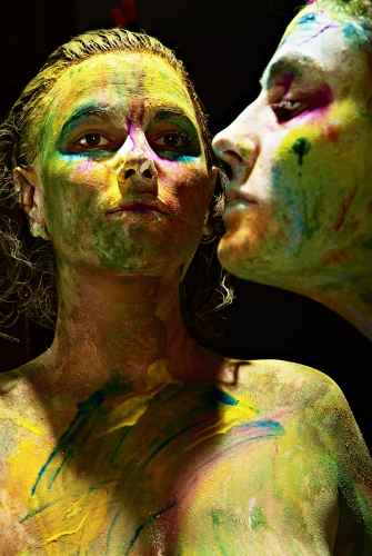 two women with painted faces